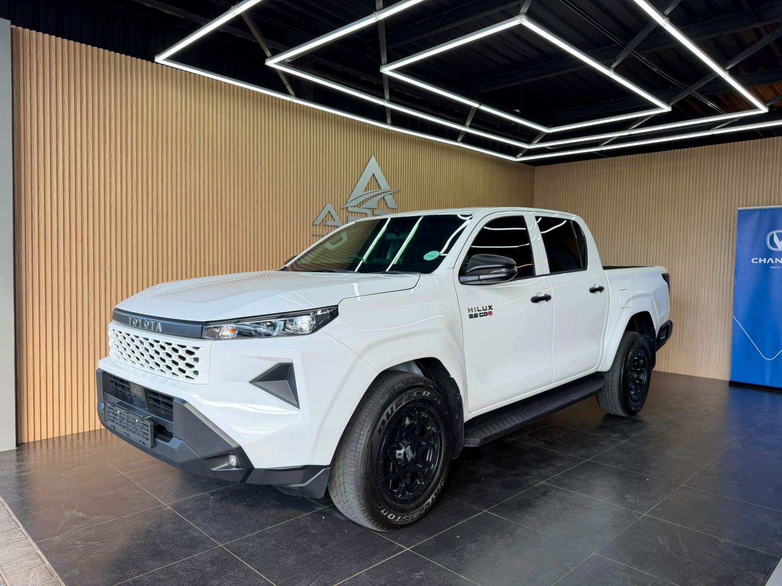 White Toyota Hilux armoured vehicle